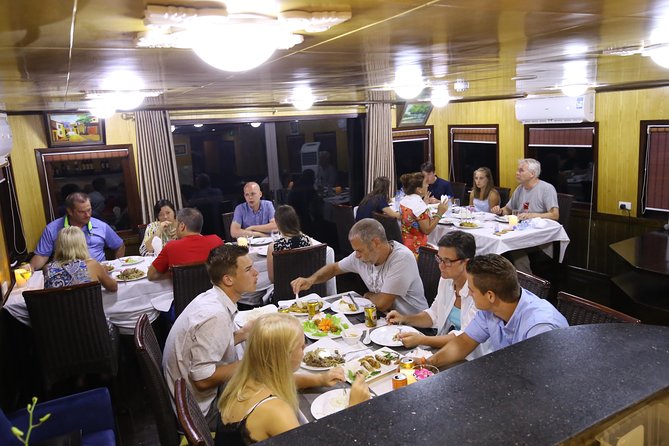 Overnight Bai Tu Long Bay and Ha Long Bay Cruise - Onboard life on a small junk: cabins, sundeck time, and crew service