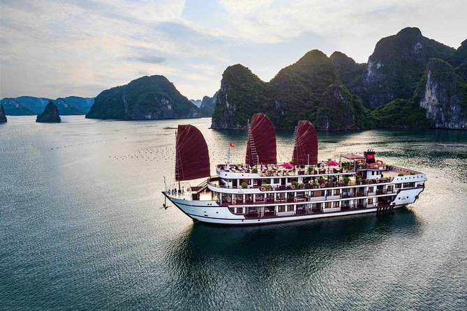 Overnight Luxury 5 Star Alisa Cruise with Meals, Kayak or Bamboo Boat - Day 1 in Ha Long Bay: caves, floating villages, and landmark stops