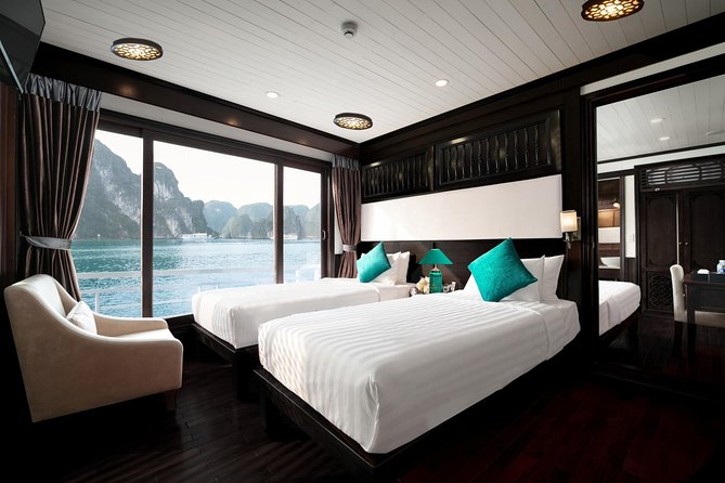 Overnight Luxury 5 Star Alisa Cruise with Meals, Kayak or Bamboo Boat - Day 2: tai chi, Sung Sot Cave, and a calm off-boarding