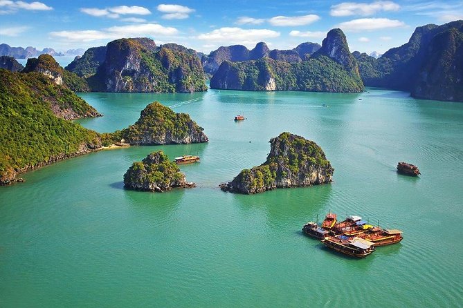 Private Halong Bay In Day - Boarding the cruise at Tuan Chau and cruising the limestone scenery