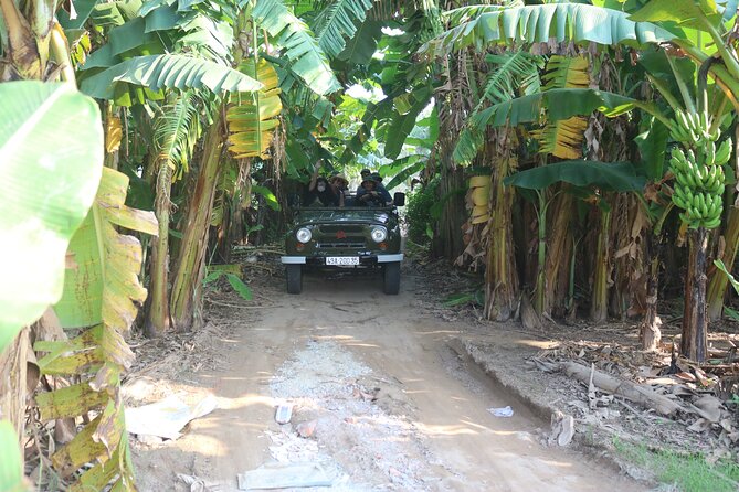 Red River Delta Countryside+ Rural Villages, rice Paddies fields - Comfort reality check: open-air jeep roads and the rain cover