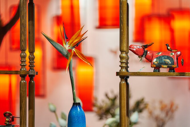 Rose Kitchen Hanoi: Market, Cooking & Culture Tour + Free PickUp - Cooking in a Hanoi villa garden, not a rushed classroom