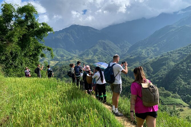 Sapa Trekking Tour 2 Days 1 Night By Bus - Day 1 village stops, Cat Cat, and a waterfall swim break