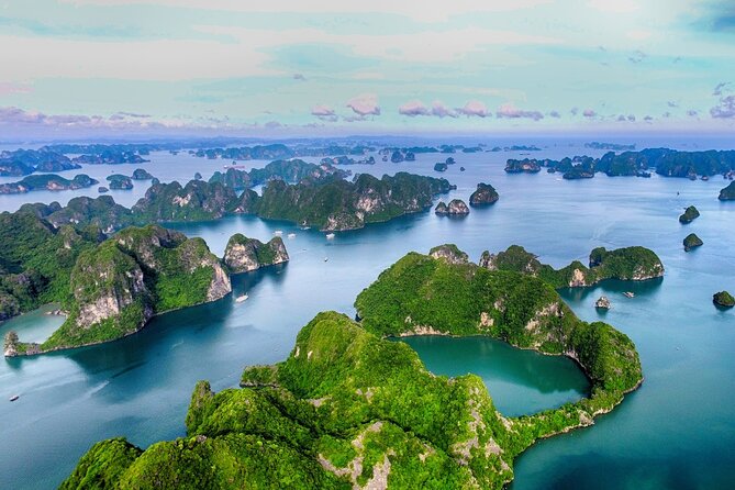 Shore Excursion: Amazing Day Cruise at Ha Long Bay - Luon Cave by kayak or bamboo boat: the sheltered-water magic