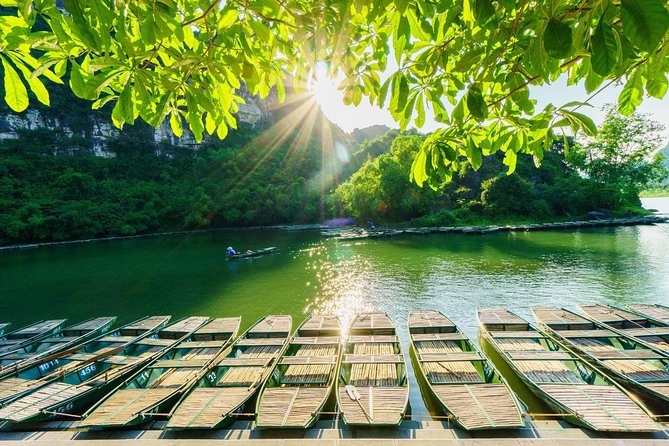 Small Group Ninh Binh Tour : Bai Dinh Trang An Mua Cave Day Tour from Hanoi - Trang An on a boat: tunnels, karst scenery, and the slow magic