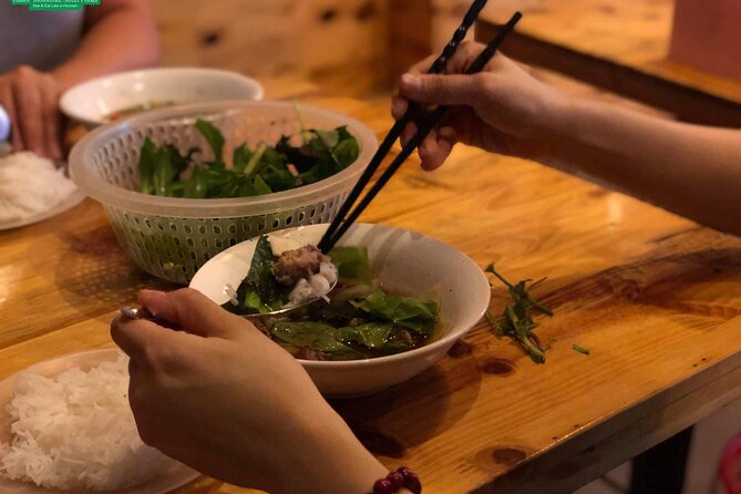 Street Food Tour Hanoi By Walking - Old City Gate: a quick orientation stop with architecture context