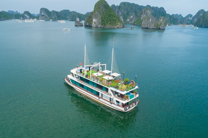 Sweetness Cruise Ha Long Bay: Caves, Kayaking, Swimming & Lunch - Ti Top Island: beach time or climb for a panorama