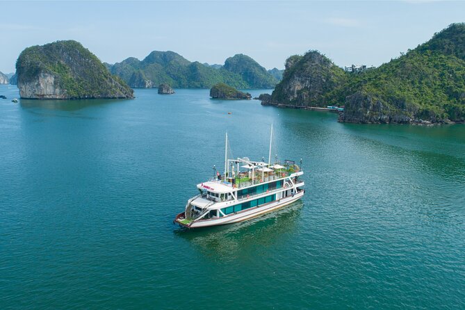 Sweetness Cruise Ha Long Bay: Caves, Kayaking, Swimming & Lunch - Sunset party, fruit, Jacuzzi, and the onboard photo moment