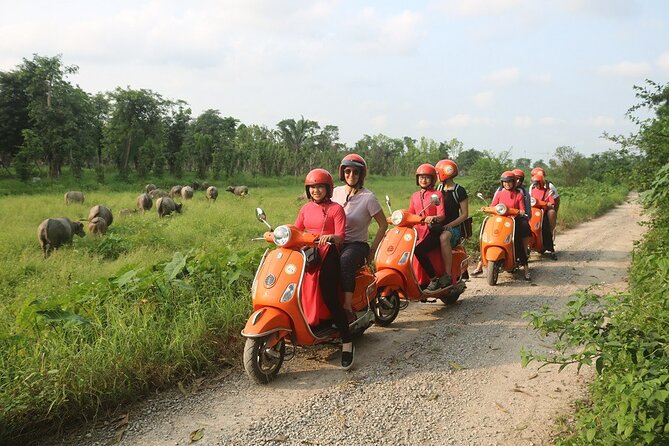 The insider's Hanoi + Train Street 4,5 Hours Female Ao Dai Riders - Ba Đình Square and the B25 Lake area