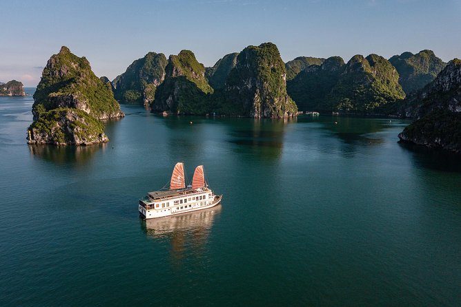 Top 1 Ha Long-Lan Ha Bay Luxury 5 Star Cruises & Balcony Cabin - Day 2: Tai Chi on the sun deck, then sunrise and caves