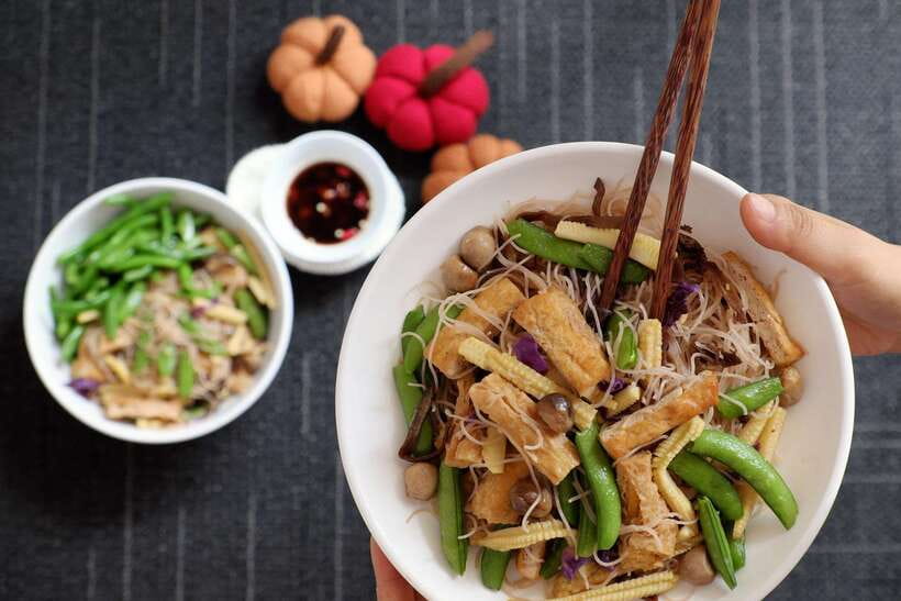 Vegetarian Hanoi Cooking Class: Master Vietnamese Cuisine - The walk from market to a local home kitchen