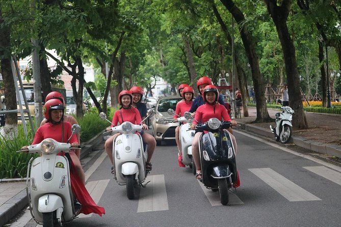 Vespa City Tour &Train Street Female With Ao Dai Riders 4,5 Hours - Vespa beats the bus for Hanoi street scenes