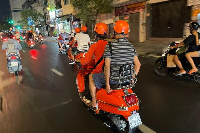 Vespa Female Ao Dai riders Night Street Food + See Train Street - The guide factor: safety, flexibility, and clear English