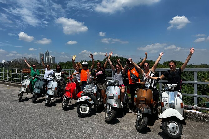 Vespa Tour HANOI BACK STREETS: FOOD+LOCAL LIFE+CULTURE & FUN - B-52 Lake, mosaic wall views, and Ngọc Hà zigzag alleys