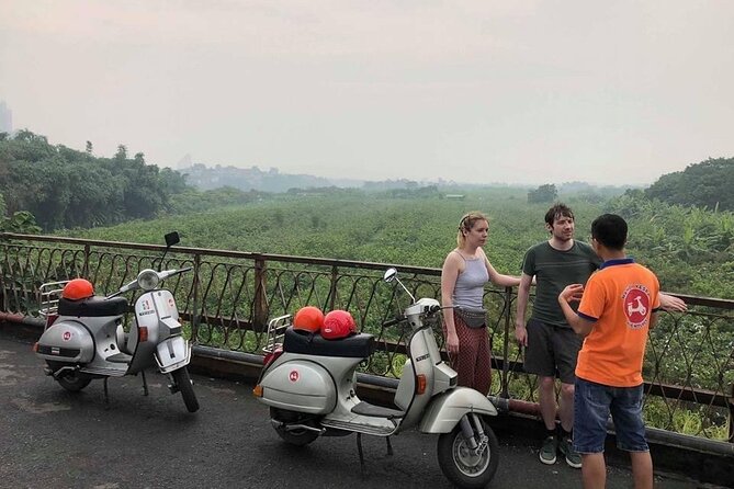 Vespa Tour HANOI BACK STREETS: FOOD+LOCAL LIFE+CULTURE & FUN - Lunch at a local spot inside Hanoi train station