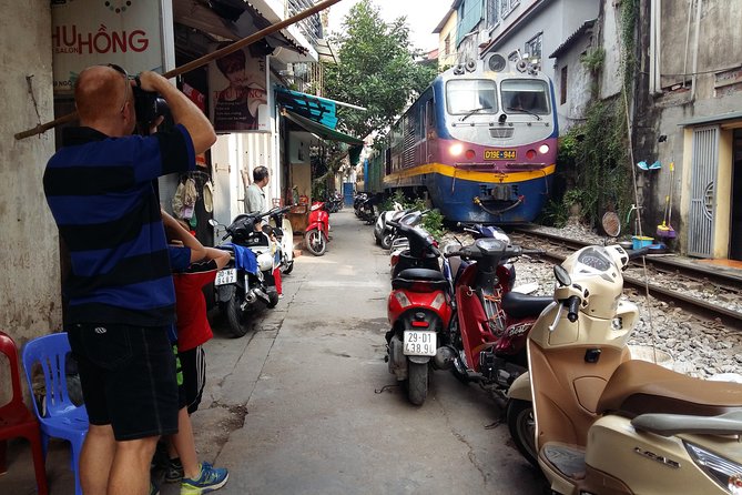 Vespa Tour Hanoi Life Rustic - Thành Công apartment buildings, overhanging rooms and a music moment